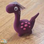jouet Puga dinosaure en latex avec couineur pour chien