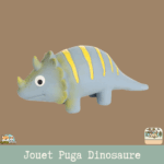 Le jouet Puga Dinosaure en latex, disponible en plusieurs couleurs, avec un couineur intégré pour chien.