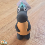 jouet Puga dinosaure en latex avec couineur pour chien