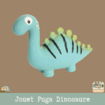 Le jouet Puga Dinosaure en latex, disponible en plusieurs couleurs, avec un couineur intégré pour chien.