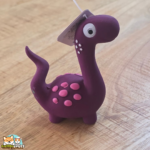 jouet Puga dinosaure en latex avec couineur pour chien