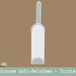 Brosse anti-peluches Trixie avec station de nettoyage automatique pour poils de chiens et chats sur tissus.
