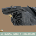 Détail de la fermeture à cordon du sac à friandises noir Trixie