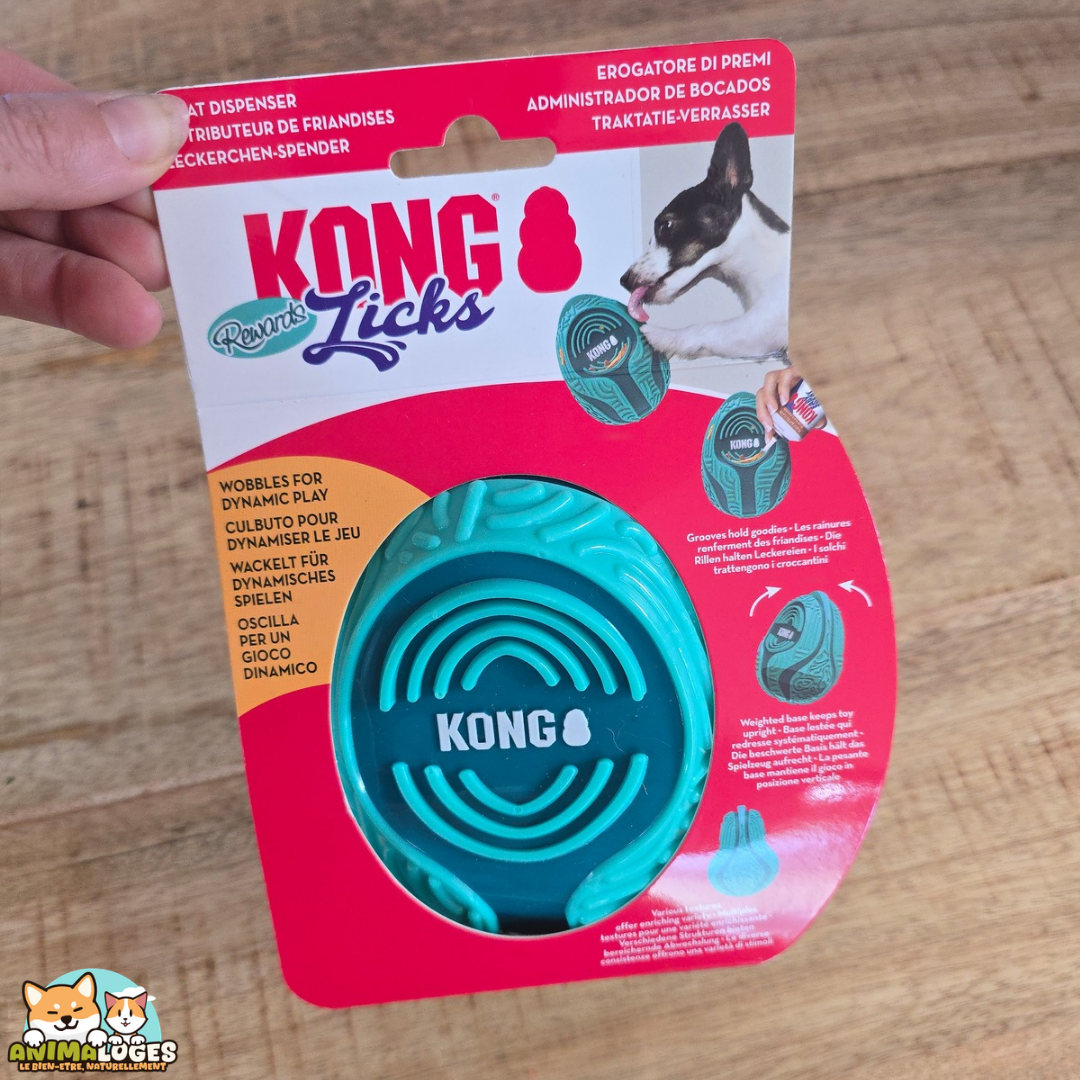 Jouet KONG Licks Rewards Wobbler vert et blanc à garnir de pâte à lécher pour chien