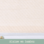 Détail du tissu en fibres de bambou du tapis Padu beige