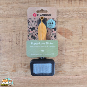 Brosse carde douce Flamingo ocre et noire pour chiot avec picots extra doux et poignée en caoutchouc
