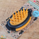Brosse de massage Calmy Flamingo ocre et noire pour chiot à poil court ou mi-long